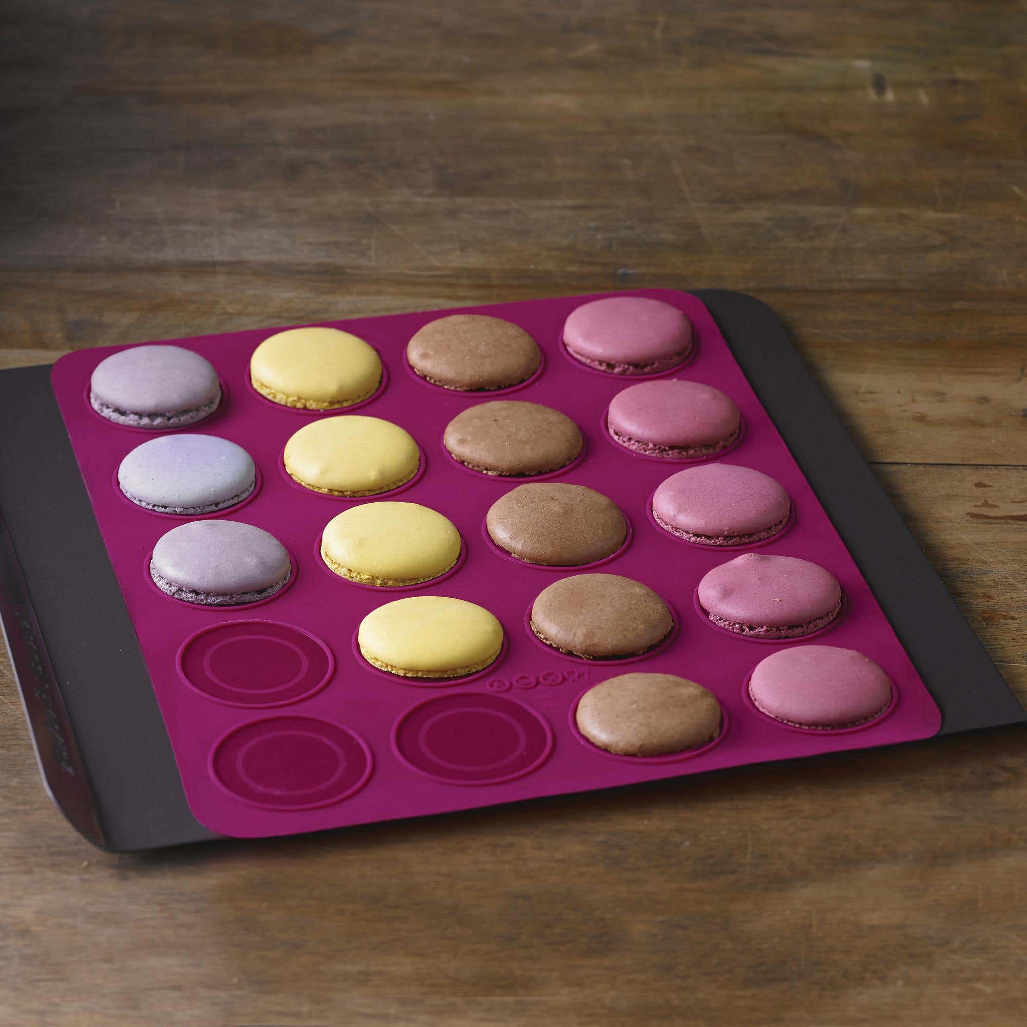 MACARON QUESTION. Please help. I recently bought a silicon macaron mat to  make perfectly shaped macarons, and every time I use it, 75% of the macarons  stick to the mat. (This picture