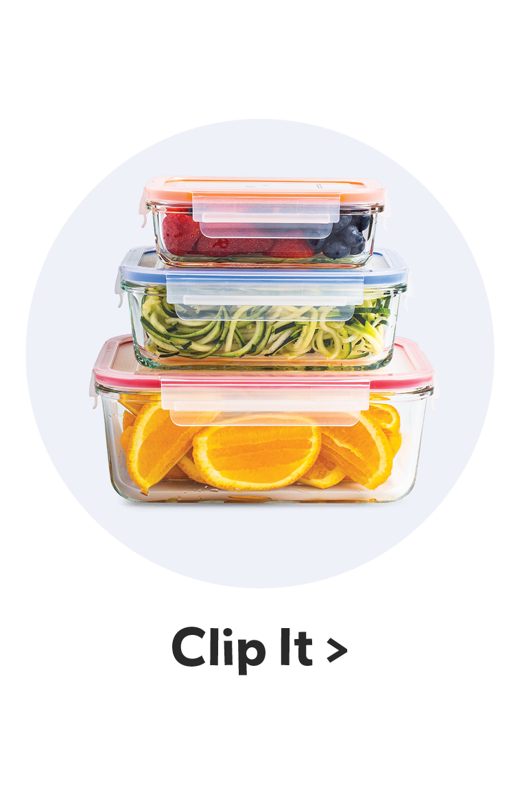 stacked food storage containers with different dried food stuffs