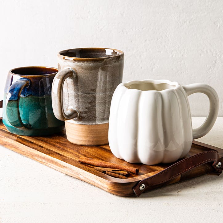 3 mugs on a wood tray