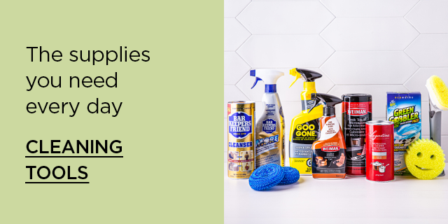 Cleaning Tools - the supplies you need every day - 4 cleaning products on a marble countertop