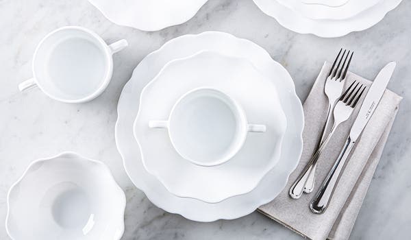 overhead view of a place setting on a marble tabletop for mobile